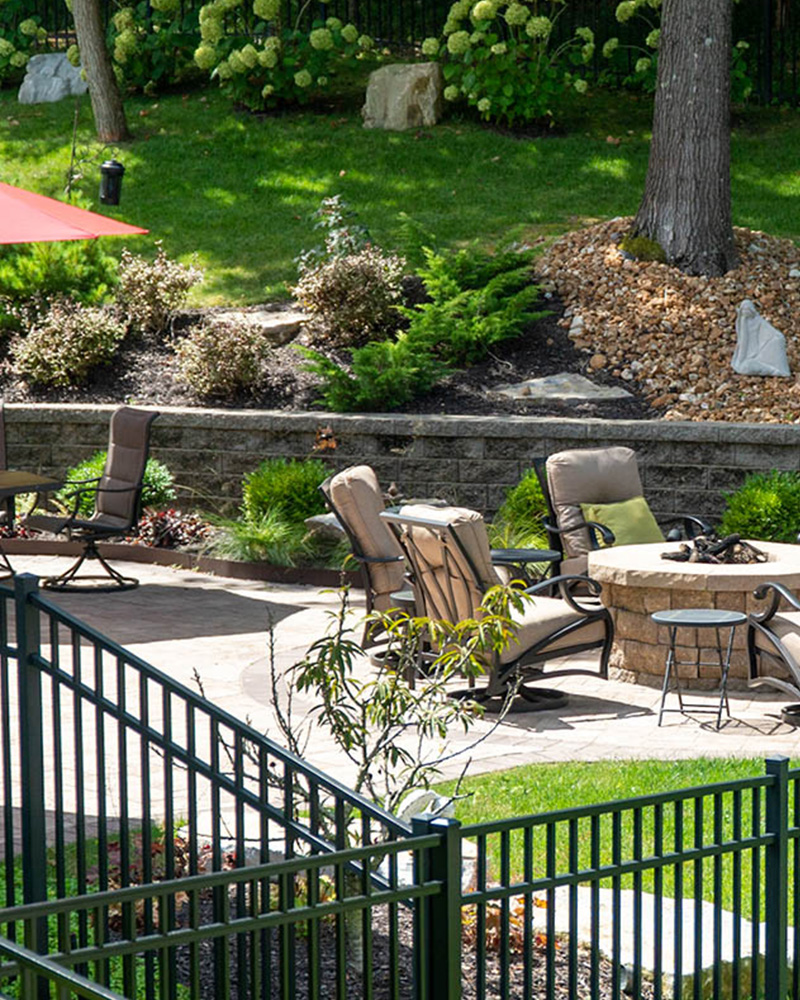 Aluminum fence around garden and patio area