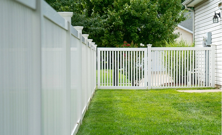 White vinyl fence